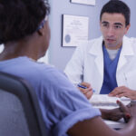 Patient preparing for first functional medicine appointment during doctor consultation