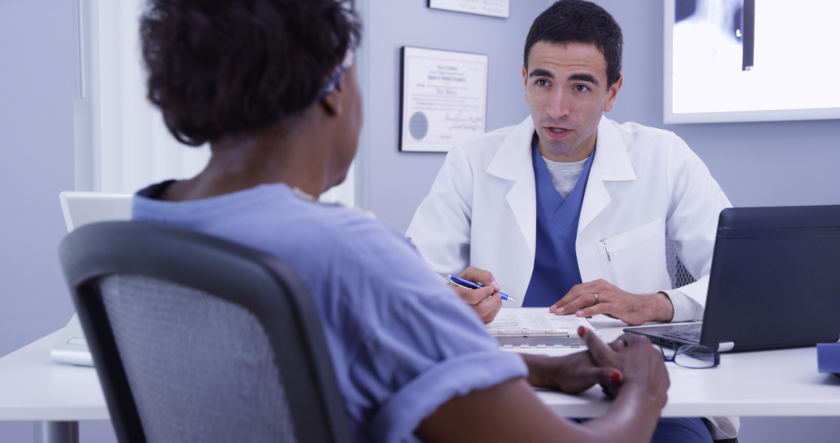 Patient preparing for first functional medicine appointment during doctor consultation