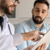 Man discussing testosterone replacement therapy for men during a medical consultation