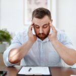 man experiencing brain fog struggling to concentrate representing functional medicine for brain fog at Apostol Integrative and Functional Medicine