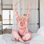 how long does HRT take woman waking up rested and energized representing hormone replacement therapy results at Apostol Integrative and Functional Medicine