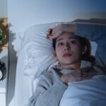 functional medicine for sleep woman lying awake at 3am unable to sleep at Apostol Integrative and Functional Medicine